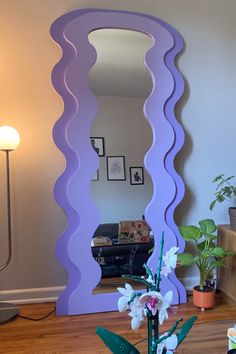 Wavy mirror in lavender. Spring home decor Curvy Mirrors, Groovy Mirror, Funky Apartment Decor, Chill Apartment Vibes, Warm Apartment Aesthetic, Room Decor Maximalist, Chill Apartment, Funky Apartment, Pastel Room Aesthetic