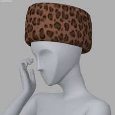 a white mannequin with a leopard print hat on top of it's head