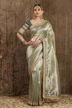 Shop for Shikhar Sharma Gold Metallic Tissue Woven Shimmer Saree With Raw Silk Blouse for Women Online at Aza Fashions Bottle Green Pattu Saree, Green Tissue Silk Saree, Shimmer Blouse Designs, Golden Saree With Contrast Blouse, Gold Pre-draped Saree With Unstitched Blouse In Slub Silk, Luxury Pista Green Pre-draped Saree In Tissue Silk, Green Tissue Saree, Fitted Pista Green Tissue Silk Saree, Metallic Tissue Saree