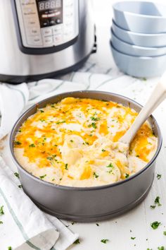 a casserole dish in front of an instant pressure cooker