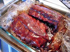 the meat is wrapped in plastic and ready to be cooked on the grill or oven