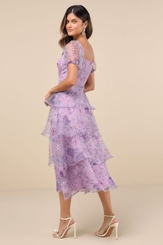 The Lulus Oh-So Stunning Purple Floral Organza Tiered Midi Dress is ready to bring extra extravagant vibes to any special occasion! Sheer woven organza boasts an elegant floral print throughout as it shapes a princess-seamed bodice, a flirty sweetheart neckline, and trendy puff sleeves (with elastic at the shoulders and cuffs). The fitted waist tops an A-line skirt that boasts chic flouncy tiers as it falls to a breezy midi hem. Hidden back zipper/clasp. Fit: This garment fits true to size. Leng Floral Organza Dress, Purple Floral Dress, Organza Dress, Tiered Midi Dress, Elegant Floral, Purple Floral, Sweetheart Neckline, Puff Sleeves, A Line Skirts