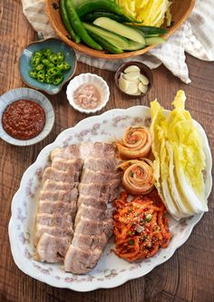 the meal is prepared and ready to be eaten on the table with other dishes around it