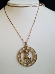 "The Age of Aquarius was in the late 1960's were this type of jewelry was in style. Also the time of the hippies and Mods, Beatles were starting out. The company Celebrity started out in New York City but never really got famous but they created this pendant which depicts the Aries Sign of A Ram. This unique pendant came from a Vintage Shop in Northglenn, Co. The chain does have some wear towards the clasp but the pendant is in great condition. This pendant necklace will arrive in a gift box wit The Age Of Aquarius, Aries Pendant, Aries Symbol, Aquarius Necklace, Mod Jewelry, Aries Sign, Zodiac Sign Necklace, Age Of Aquarius, Zodiac Jewelry