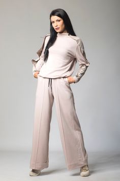 "Black Elegant Set, Cotton Pants and Top, Wide Leg Pants Lounging will never be the same again! This simple and comfortable co-ord set is perfect if you're chilling at home, going for a run, working out, etc. It's versatile and proves to be useful in several ways, which makes it a must-have in your wardrobe. Effortlessly chic and stylish, it has a wide-legged comfy pair of pants and a sweatshirt with a flap-like detailing on the upper half. 🌀 Materials & Care Cotton-100% Polyester elements Casual Fall Sets With Wide-leg Pants, Oversized Pants With Elastic Cuffs For Fall, Long Wool Coat, Never Be The Same, Legging Outfits, Elegant Sets, Womens Leggings, Womens Pants, Plus Size Kleidung