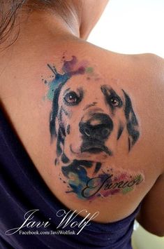 a woman with a dog's face painted on her back shoulder and neck tattoo