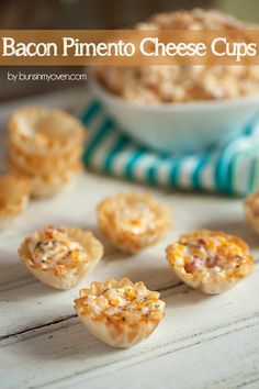 bacon pineapple cheese cups on a table with other appetizers in the background