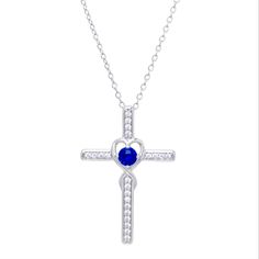 18" Sterling Silver Chain With 1.1" Cross Pendant With White Sapphires And Blue Spinal Center Stone Within Open Heart Design Brand New. Never Worn. Comes In A Box. Ready For Gift Giving. A Really Beautiful Piece. Blue Pendant Necklace With Silver Chain, Blue Cross Necklace As Gift, Blue Cross Necklace, Blue Sterling Silver Cross Necklace Gift, Blue Cross Pendant Necklace For Anniversary, Blue Cross Pendant Necklace For Gift, Blue Pendant Cross Necklace Gift, Blue Adjustable Cross Necklace, Blue Sterling Silver Cross Pendant Necklace