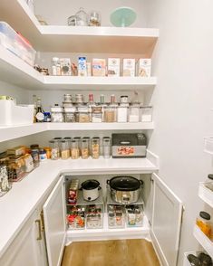 an open pantry with lots of food in it