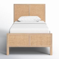 an image of a bed with wicker headboard and foot board on the side