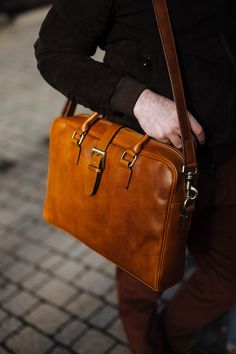 "This brown cowhide leather Briedfcase is 100% handmade. Our briefcase created especially for a person who is looking for a stylish but also functional bag. It's perfect at work and for everyday urban life. You can carry all your stuff, mobile phone and iPad perfectly organized. it has some inner pockets and 2 outter. the cross body strap is adjustable. like all of my shop's product, this bag is also design and made by Alma Milano. and it's 100% handmade Dimentions: -height :28 Cm / 11'' - Width Leather Briefcase With Soft Leather As Gift, Leather Briefcase Perfect For A Gift, Soft Leather Briefcase As Gift, Brown Leather Strap Briefcase For Business, Leather Briefcase With Leather Handles As Gift, Brown Leather Strap Briefcase For Daily Use, Brown Leather Strap Briefcase For Everyday Use, Brown Leather Briefcase With Leather Strap, Men Briefcase