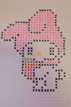 a cross - stitch pattern with an image of a woman's face in pink and black