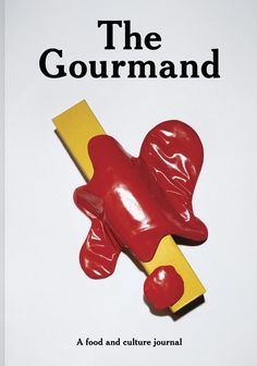 a book cover for the gourmand with a red and yellow object on it