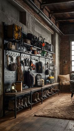 An industrial-styled room with a metal camping gear wall, displaying outdoor gear in a rugged, organized manner.