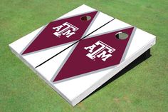 a pair of maroon and white cornhole game pieces