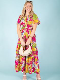 Indulge in the beauty and charm of summer with our Daffodil Garden Maxi Dress. Featuring a vibrant floral print, this dress is the perfect addition to your wardrobe. Made with lightweight material and a flowing design, it offers both style and comfort. Make a statement and brighten up any occasion with this must-have dress! Material: 50% Cotton, 50% Rayon Care: Machine wash cold. Tumble dry. Size. Fits true to size. Summer Midi Dress With Vibrant Print For Garden Party, Multicolor Print Sundress For Garden Party, Multicolor Floral Midi Dress For Beach, Vibrant Multicolor Floral Dress For Garden Party, Multicolor Floral Dress With Vibrant Print For Garden Party, Summer Garden Party Multicolor Print Maxi Dress, Summer Sundress With Vibrant Print For Garden Party, Summer Multicolor Print Midi Dress For Garden Party, Summer Garden Party Multicolor Print Midi Dress