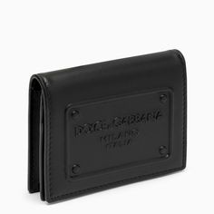 Black Leather Wallet From Dolce & Gabbana Featuring A Snap Button Flap, Internal Card Slots And Tone-On-Tone Logo On The Front. Width 10,5 Cm X Height 8 Cm X Depth 0,5 Cm Size Type: Int Material: Leather Sku: 2f-Bp1643ag218/O_dolce-80999_100 Welcome To The Official Luosophy Poshmark Closet! Luosophy Is A Luxury Brand Reselling Company Founded In San Diego, Ca From 2016. All Our Products Are Imported From Italy And Sold In The Usa. We Do Our Best To Provide High Fashion, Luxury Items At Affordabl Designer Black Bifold Card Holder, Black Wallets With Logo Plaque For Everyday Use, Luxury Black Wallet With Logo Plaque, Designer Black Card Holder With Coin Pocket, Designer Black Bifold Wallet, Elegant Black Card Holder With Logo Plaque, Designer Black Leather Wallet, Black Evening Wallet With Logo Plaque, Black Leather Card Holder With Logo Plaque