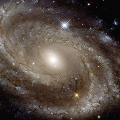 an image of a spiral galaxy in the sky