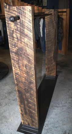 a large wooden object sitting on top of a floor