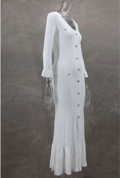 This dress features medium stretch and flare sleeves, made from a durable polyester fabric. Its solid pattern and slim fit create a pleated silhouette, while the v-neckline and button decorations add a touch of elegance. The ankle-length design and material make it suitable for all seasons, and it is designed for middle-aged women, originating from Mainland China, Guangdong. Fitted V-neck Midi Dress With Button Cuffs, Elegant Stretch Dresses With Button Closure, Backless Cocktail Dress, Cocktail Bridesmaid Dresses, Strapless Tube Dress, Backless Evening Dress, Long Sleeved Dress, Button Decorations, 1920s Flapper Dress