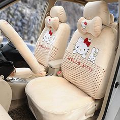 the interior of a car with hello kitty seat covers