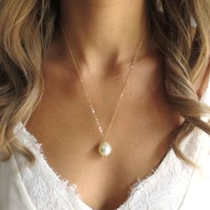 "This necklace features a large freshwater pearl hung on a dainty, genuine gold filled chain. Beautiful and classic!  Shop Landon Lacey Jewelry » www.etsy.com/shop/landonlacey it's in the DETAILS . . . » 14k gold filled cable chain  » Freshwater pearl  » Spring ring clasp » The model is wearing this necklace at 20\" but she is petite. This may sit longer or shorter depending on body type. Please measure!  it's in the OPTIONS . . .  » Select your length at checkout it's in the DELIVERY . . . All Landon Lacey Jewelry comes mailed in my signature gift box or an organza gift bag. Leave a note at checkout if you'd like a personal message included. it's in the CONNECTIONS . . .  WEBSITE: www.landonlacey.com FACEBOOK: www.facebook.com/landonlacey INSTAGRAM: www.instagram.com/landonlaceyjewelry PI Classic Gold Pearl Necklace As Bridesmaid Gift, Classic Gold Pearl Necklace For Bridesmaid Gift, Gold Pearl Pendant Jewelry For Bridesmaid Gift, Gold Necklace With Pearl Pendant For Bridesmaid, Gold Necklaces With Pearl Charm For Bridesmaids, Gold Necklace With Pearl Charm For Bridesmaids, Large Pearl Necklace, Dainty Pearl Necklace, Pearl Necklace Gold