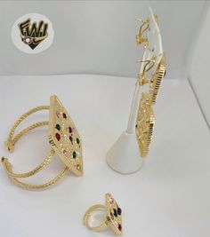 Description: -Necklace, Bangle, Ring and Earrings Set. -Material: 18k Gold Overlay (BGO). -Necklace Width: 60mm. -Earrings Measure: 65mm -Bangles Width: 51mm. -Ring Size: Adjustable -Available in Size: 16" plus Extension. Bangle Ring, Gold Overlay, Earrings Set, Big Size, Earring Set, Size 16, 18k Gold, Ring Size, Bangles