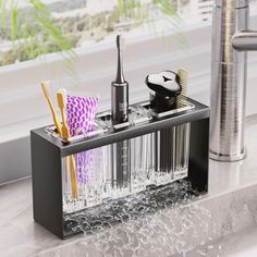 Elevate Your Daily Wash Up with our innovative toothbrush holder. This functional holder set is designed to keep your bathroom or vanity essentials within easy reach while allowing them to dry quickly. Its minimalist design lends a clean and modern aesthetic! Enjoy a clean and clutter-free countertop while storing your toothbrushes, toothpaste, and other bathroom accessories such as combs, razors, and facial brushes. The holder cup is detachable, making it a breeze to clean. Made of premium ABS Vanity Essentials, Toothbrush Organizer, Countertop Accessories, Tooth Brushing, Toothbrush And Toothpaste, Toothbrush Organization, Toothbrush And Toothpaste Holder, Counter Top Accessories, Toothbrush Holders