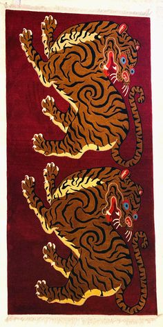 an image of two tigers on a red background