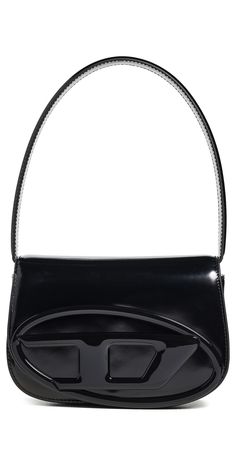 Find DIESEL 1dr Shoulder Bag on Editorialist. Cowhide. Tonal logo emblem at front. Patent finish. Fold-over flap with magnetic closure. Patch interior pocket. Optional, adjustable strap. Textile lining. Weight: 26oz / 0.74kg. Imported, China. Measurements: Height: 8.25in / 21cm Length: 7.75in / 20cm Depth: 2in / 5cm Strap drop: 20.75in / 53cm Handle drop: 6.75in / 17cm Trendy Leather Bag With Glossy Finish, Trendy Glossy Leather Bag, Designer Black Shoulder Bag With Glossy Finish, Chic Glossy Finish Shoulder Bag For Travel, Chic Glossy Shoulder Bag For Travel, Modern Glossy Shoulder Bag, Modern Glossy Finish Shoulder Bag, Modern Patent Leather Bag For Everyday, Modern Patent Leather Top Handle Bag