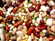 many different types of beans and nuts together