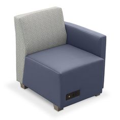 a blue and gray chair sitting on top of a white floor