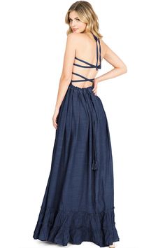 Crinkle maxi dress with a stretchy smocked bodice and halter neck tie. Bare, strappy back with a?drawstring tie at the waist. Pleating at?the waist with a full skirt bottom. Partially lined. CARE | Hand Wash Cold? CONTENTS | 100%?Polyester/Lining: 100% PolyesterMEASUREMENTS |?54"/137 cm Top to Bottom (Size Small) MODEL | 5'8 - wearing a size SmallIMPORTED