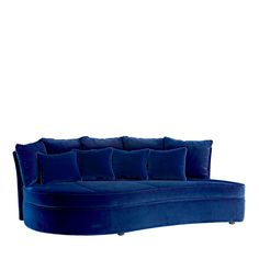 a large blue couch with six pillows on it's back and two sides facing each other