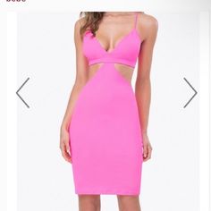 a pink dress with cutouts on the sides