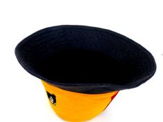 This Rasta Jamaican Bucket hat is perfect for Summer Reggae Festivals. This solid Bucket hat features a Jamaican Rasta Inspired Striped Band atop a solid , Red green yellow Rasta color bucket hat. Rock this hat as you dance the night away at your next outdoor concert or event. Fashionable and a must-have . This Hat is unisex that looks great on both men and women . This Hat is very durable and can be used as a special gift . -Solid Unisex Jamaican Adult Bucket Sun Hat -Rasta Reggae Inspired Stri Beach Cap Felt Hat, Beach Cap Felt Hat One Size Fits Most, Beach-style Felt Cap One Size Fits Most, Beach Felt Cap, Wide Brim Reversible Hat For Festivals, Reversible Wide Brim Hat For Festivals, Hemp Hat, Rasta Hat, Reggae Festival