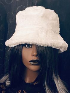 "These custom made Faux Fur Bucket Hats are Hand Made by @FierceByFierce Wear these \"and you're guaranteed to attract attention with these unique pieces. Spice up an everyday outfit, or a take a dressy outfit to a new level, or just throw one on when your having a bad hair day. The possibilities are endless.  Make it your own and let your imagination run wild. All  hats are One size, so super cool and easy to wear. Made with faux fur. This bucket hat will keep you stylish. One Size. Hand wash and dry flat. SHIPPING: Please allow an estimated 3-5 business days to process before shipping Please feel free to message us if you have any questions or would like something custom." Adjustable Brimmed Faux Fur Hat, Adjustable Faux Fur Brimmed Hat, White Faux Fur Winter Hat, White Winter Bucket Hat With Short Brim, White Brimmed Bucket Hat For Winter, White Short Brim Bucket Hat For Winter, White Wide Brim Mini Hat For Winter, White Curved Brim Bucket Hat For Winter, Rave Hats