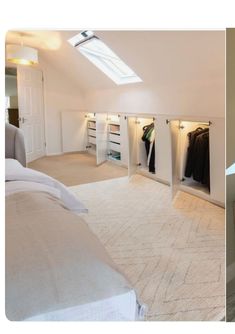 an attic bedroom with white walls and closets