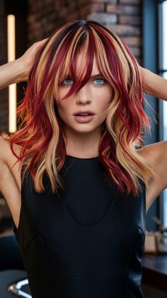 This layered style combines red and blonde hair color with striking face-framing highlights that draw attention to the eyes. The loose waves add movement, while the bright blonde accents bring contrast and dimension. This look is ideal for anyone wanting a vibrant, layered style that feels fresh and playful. Red And Blonde Hair Color, Red And Blonde Hair, Dimensional Hair, Red And Blonde, Framing Highlights, Layered Style, Bright Blonde, Hair Color For Women, Color Techniques