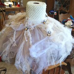 a dress made out of tulle and beads