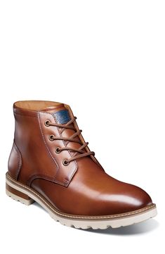 A stitched welt and sturdy lugs lend rugged appeal to a smooth leather lace-up boot with a padded collar and cushioned insole built for comfort. Lace-up style Removable, cushioned insole Leather upper/textile lining/rubber sole Imported Classic Work Boots With Lug Sole, Brown Lace-up Boots With Lug Sole And Moc Toe, Classic Brown Boots With Lug Sole, Brown Leather Chukka Boots With Lug Sole, Classic Formal Lace-up Boots With Lug Sole, Classic Moc Toe Combat Boots With Leather Footbed, Brown Boots With Reinforced Toe For Formal Occasions, Classic Lace-up Work Boots With Lug Sole, Brown Lace-up Chukka Boots With Lug Sole