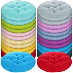 a stack of round cushions sitting on top of each other