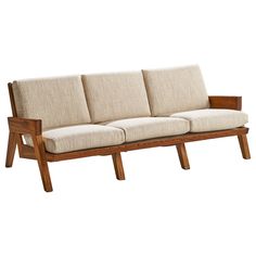 a wooden couch with three cushions on it's back legs and arms, against a white background