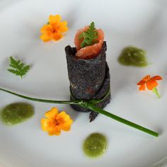 a white plate topped with food and veggies