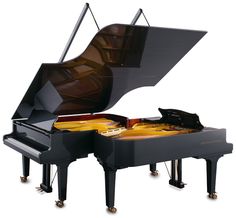 a grand piano is shown with the lid open to show it's musical contents