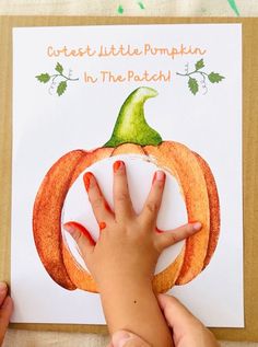 a child's hand on top of a piece of paper that says, cute little pumpkin in the patch