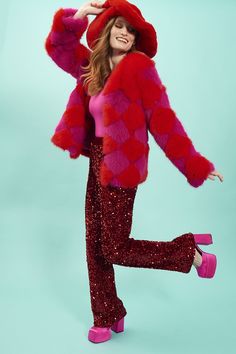 Our pink and red diamond check jacket made from the finest faux fur is a real statement piece. Beautiful and bold this sumptuously soft coat will keep you warm and in style throughout the cold winter months.  15% acrylic 85% modacrylic Trendy Pink Faux Fur Coat, Glamorous Pink Winter Outerwear, Red Faux Fur Coat, Red Outfits, Faux Fur Bag, Day Festival, Check Jacket, Fur Gloves, Fur Headband