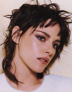 a close up of a person with short hair