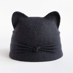 Merino wool hat with small visor an indispensable accessory in the cold season. Felted hat is warm, cozy and soft, it does not irritate your skin. Hat with cat ears great gift for cat lovers women. This item made to order and ready to ship in 3-5 business days after payments. Please choose size and color. ON THE PICTURE: size S, color wool-graphite (ready to ship). The circumference of your head approximately 22 inches (56 cm), length approx 7.7 inches (19,5 cm). MATERIALS: The cat ears hat is m Gray Winter Cloche Hat With Curved Brim, Gray Fitted Felt Hat For Winter, Gray Felt Hat For Winter, Casual Cat Ears Winter Hats, Winter Mini Hats With Short Brim, Winter Mini Felt Hats With Short Brim, Winter Mini Hats With Short Brim In Felt, Winter Wool Mini Hats, Adjustable Gray Felt Winter Hat