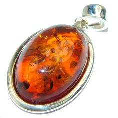 Handmade Unique 925 Sterling Silver pendant with unique one of a kind Amber,  12.50 grams of marvelous handcrafted jewelry design. Only one piece availble ready to ship! It's unique worldwide pendant - simply piece of art in world of fine jewelry. Baltic Amber  .925 Sterling Silver handmade Pendant  PENDANT DETAILS: Weight: 12.50g; Material: Sterling Silver; Main stone: Amber; Dimension: 2 inch; Inner Bail Diameter: 1/4 inch; Stamp / Mark: 925; Condition: New; Main color: brown; Shape: abstract; Luxury Baltic Amber Necklace, Luxury Baltic Amber Pendant Necklace, Luxury Amber Spiritual Necklace, Shifting Closet, Unique Silver Jewelry, Jewelry Online Store, Ruby Jewelry, Silver Pendants, Handmade Pendant